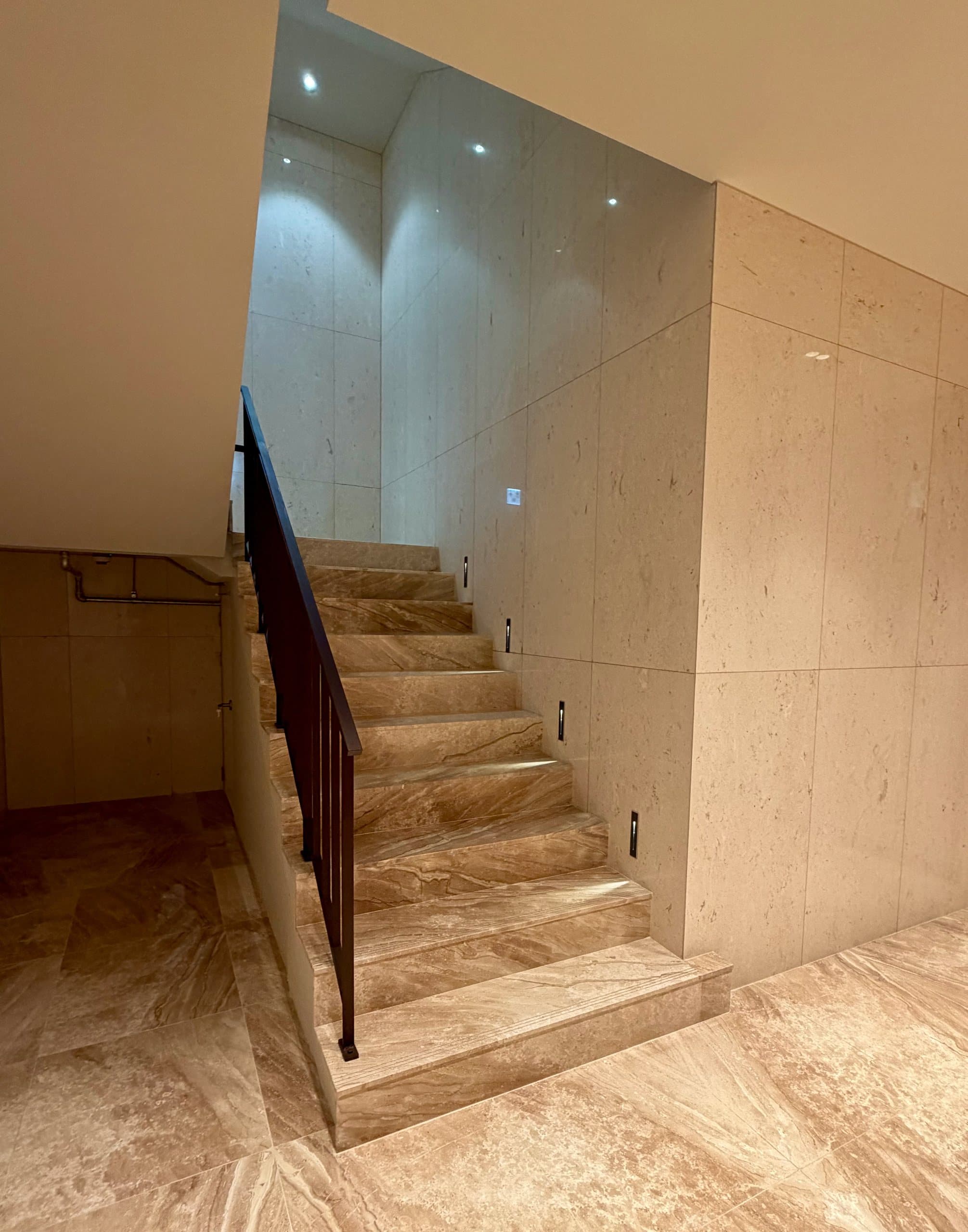 A marble staircase between floors